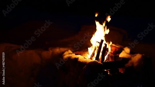 Big fire in a masoned fireplace in winter