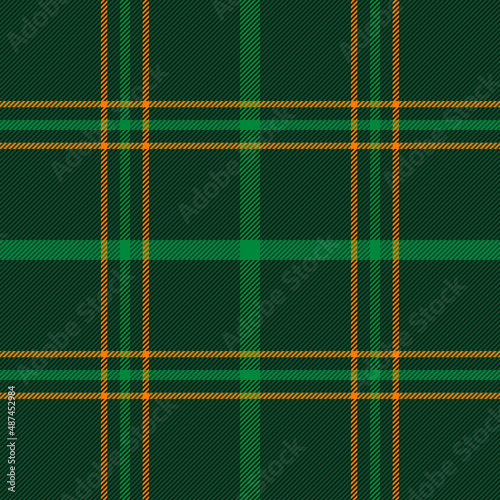 St. Patricks day tartan plaid. Scottish pattern in green, orange and dark green cage. Scottish cage. Traditional Scottish checkered background. Seamless fabric texture. Vector illustration