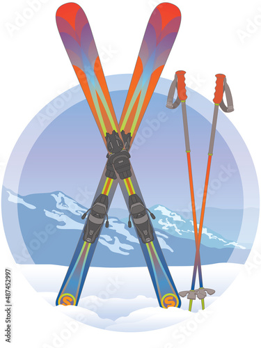 freestyle skiing, pair of skis crossed and ski poles in snow with mountains in background