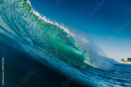 Fototapeta Naklejka Na Ścianę i Meble -  Ideal wave in ocean. Turquoise wave in Brazil with morning light