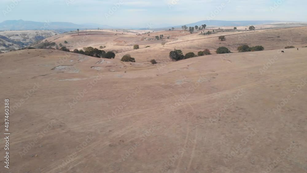 Aerial view of yellowish hill. 4k video of hills in Tepotzotlan, Mexico. Wild life and nature concept Aerial view of yellowish hill. 4k video of hills in Tepotzotlan, Mexico. Wild life and nature concept