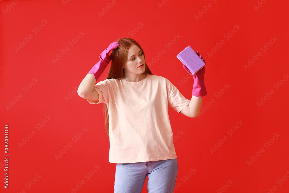 Young woman with sponge on color background Young woman with sponge on color background