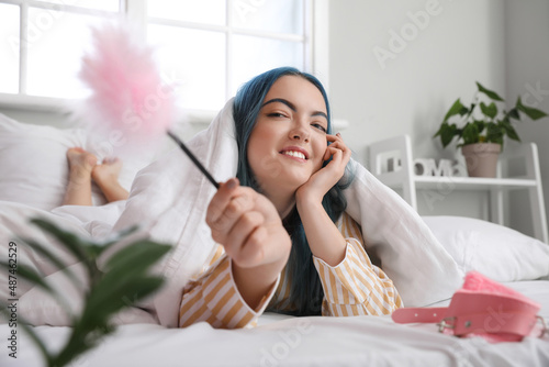 Beautiful young woman with ...