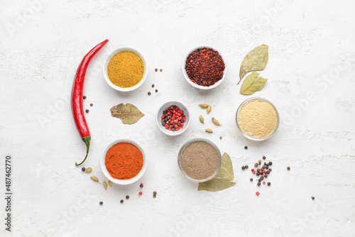Fototapeta Naklejka Na Ścianę i Meble -  Set of different aromatic spices on light background