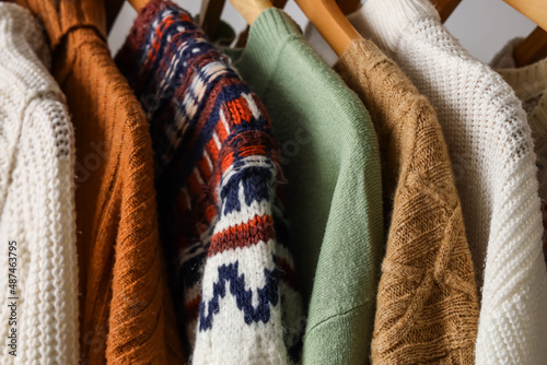 Closeup view of stylish warm sweaters © Pixel-Shot