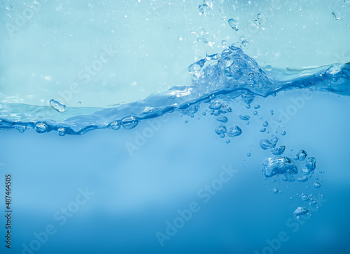 Water and air bubbles and water droplets, isolated on white background.water is pure transparent liquid.for design,advertising,text space