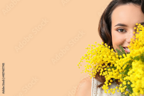 Beautiful young woman with ...