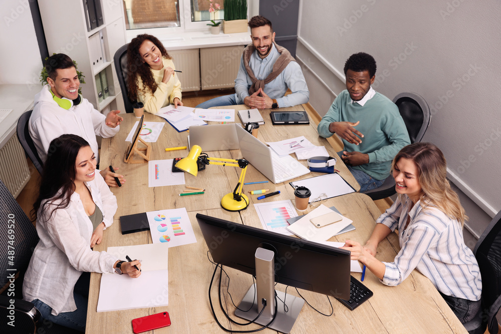 Fototapeta premium Team of employees working together in office. Startup project