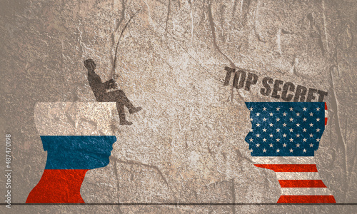 Fotografie One businessman steal the top secret from another