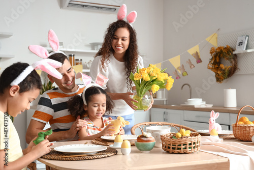 Happy family at dining tabl...