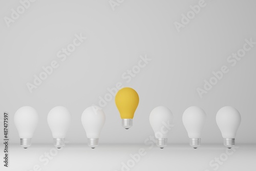 Schilderij op canvas Light bulb yellow outstanding among lightbulb white