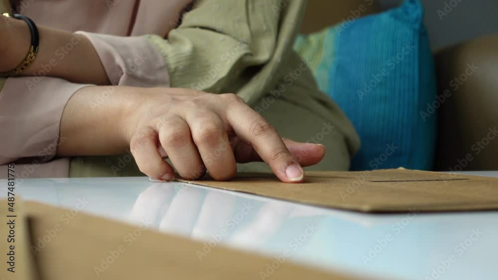 women hand reading a food menu at cafe. women hand reading a food menu at cafe.