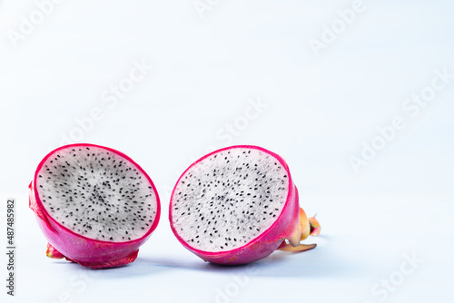 Half dragon fruit or pitaya on color background, Tropical fruit