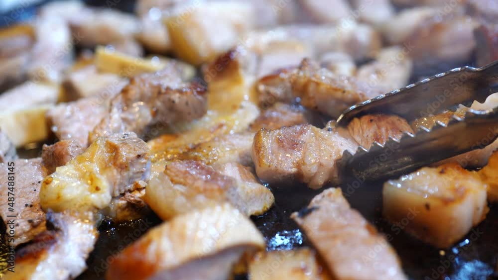 Pan-fried cooked black pork meal in Korea restaurant Pan-fried cooked black pork meal in Korea restaurant