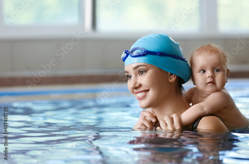Female coach and adorable b...
