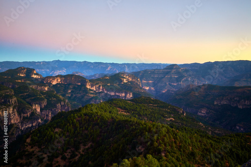 barrancas en un amanecer con hermosos colores en el cielo y un bosque verde entre las montañas en la sierra madre occidental la ciudad durango mexiquillo photo