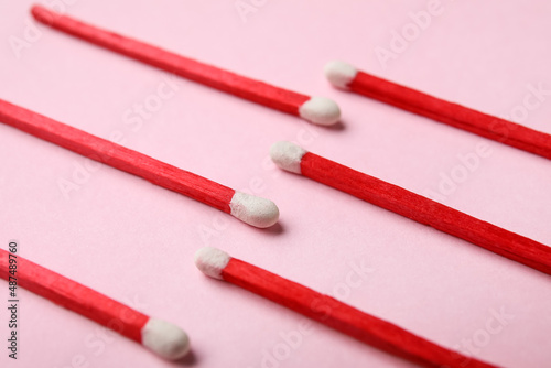 Red wooden matches with whi...