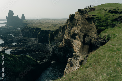 Lava formations, called Londrangar, at the south coast of Snaefellsnes peninsula, Iceland photo