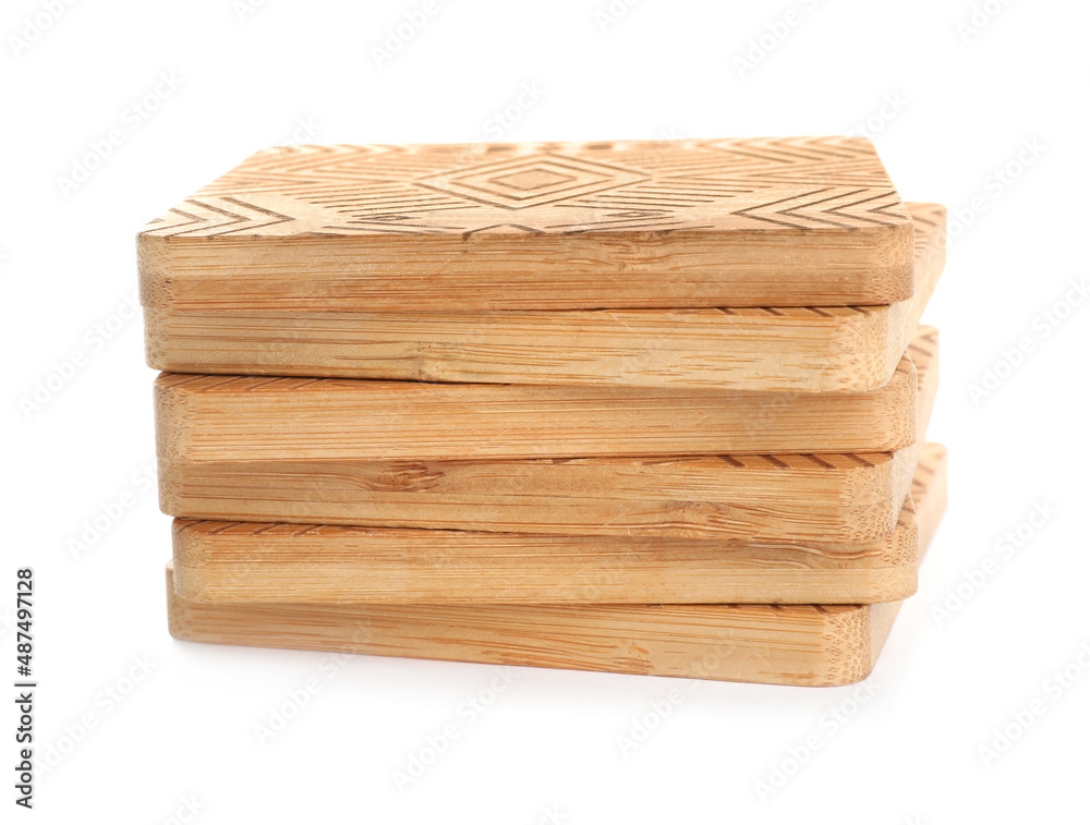Stack of wooden cup coasters on white background Stack of wooden cup coasters on white background