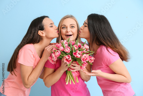 Young girls kissing mature ...