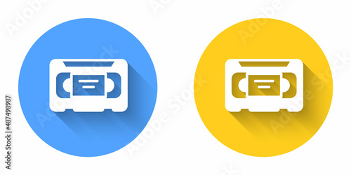 White VHS video cassette tape icon isolated with long shadow background. Circle button. Vector