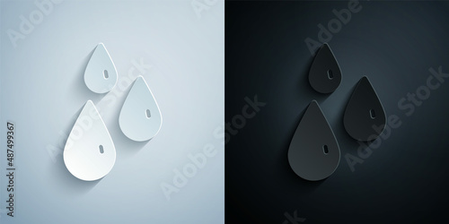 Paper cut Drops of honey icon isolated on grey and black background. Honey cells symbol. Sweet natural food. Paper art style. Vector
