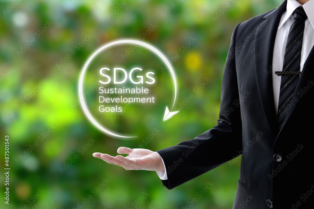 SDGsを掲げるビジネスマン SDGsを掲げるビジネスマン