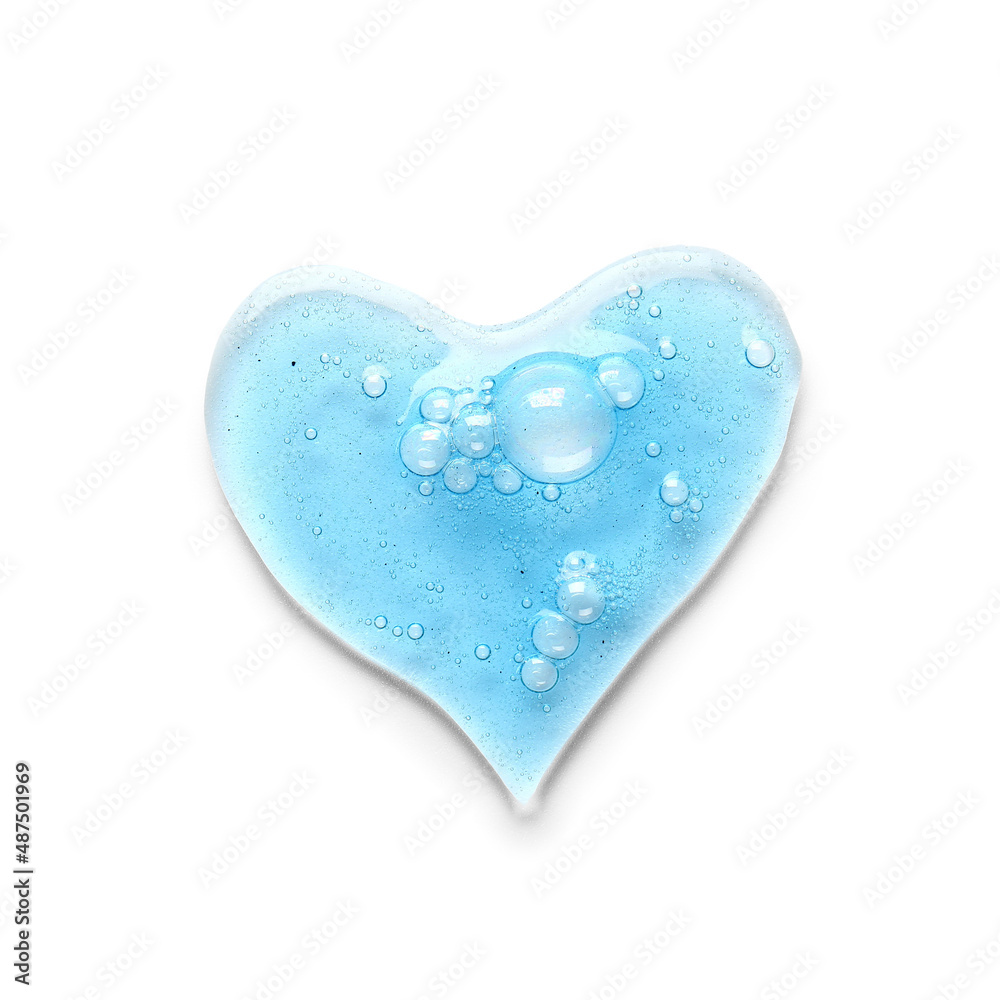 Heart-shaped drop of cosmetic serum on white background