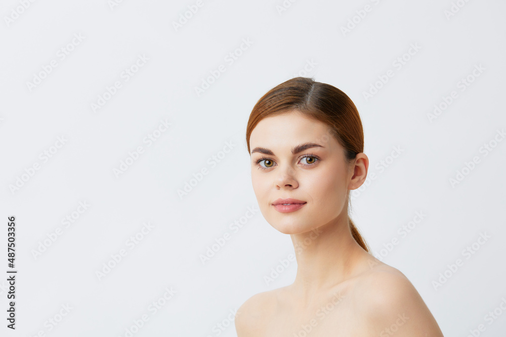 portrait woman red hair bare shoulders cosmetics skincare light background portrait woman red hair bare shoulders cosmetics skincare light background