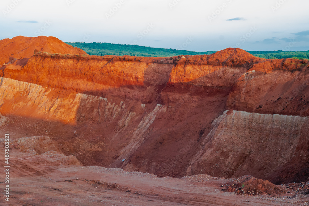 A quarry where red clay is mined.