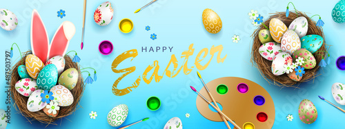 Blue postcard with Easter eggs in the nest, rabbit ears, a palette of paints