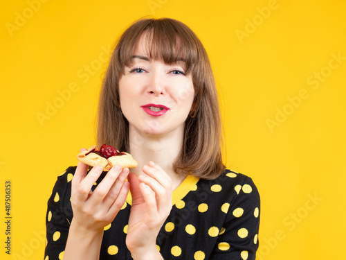 Woman with cake. Girl is ho...