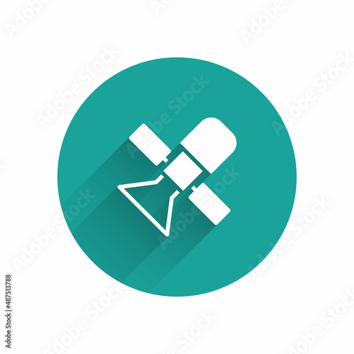 White Satellite icon isolated with long shadow background. Green circle button. Vector