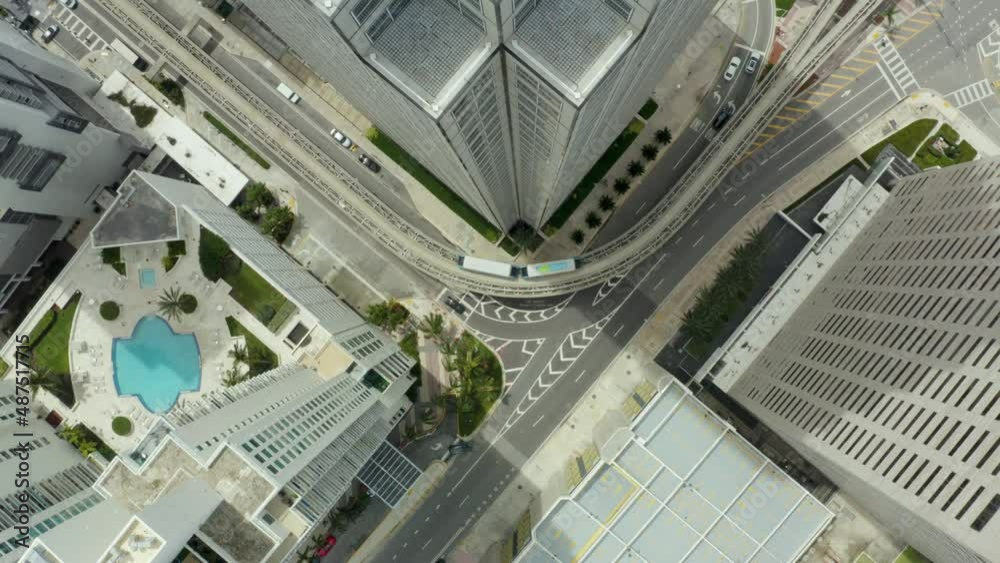 Aerial birdseye ascending over little traffic in Miami avenue Aerial birdseye ascending over little traffic in Miami avenue