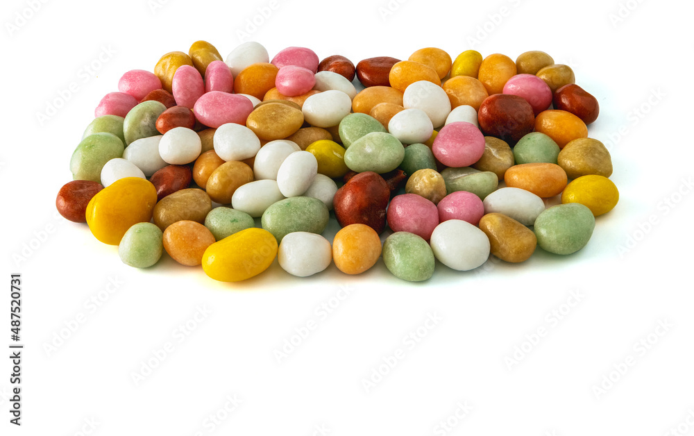 dragees candy multicolored sea pebbles on a white background dragees candy multicolored sea pebbles on a white background