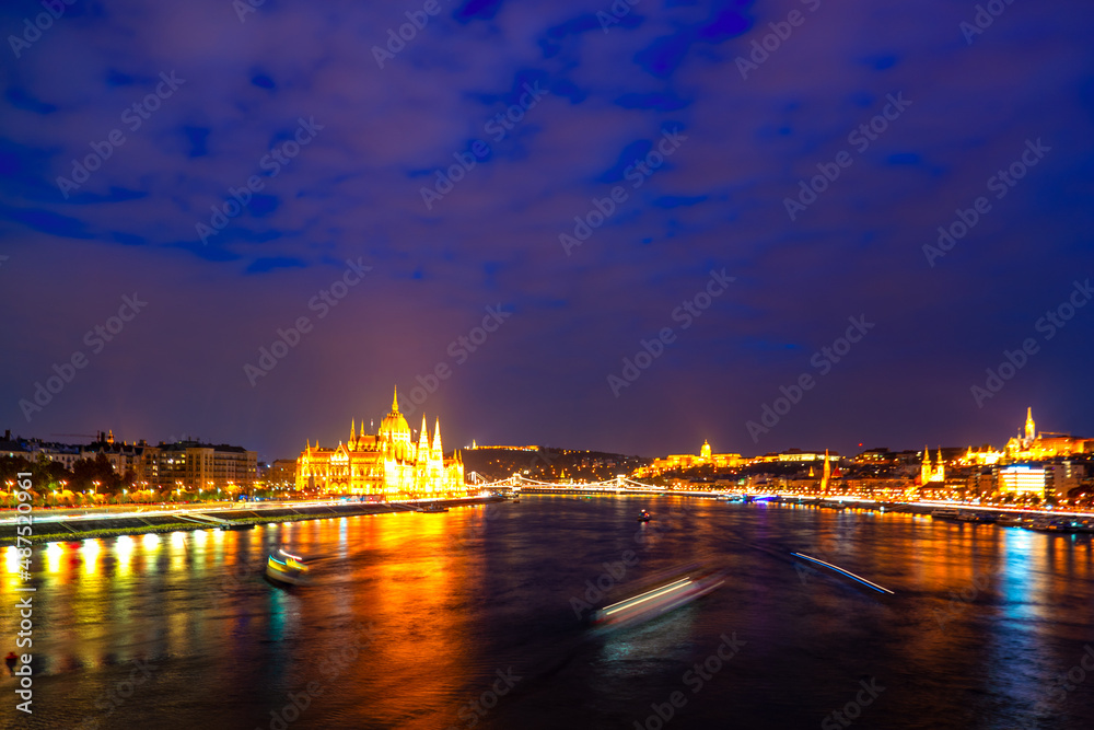 Wonderful architecture at night. Hungary, budapest. Wonderful mesmerizing view of the city at night illuminated by lights on the danube river. Beautiful landscape on the parliament on the river