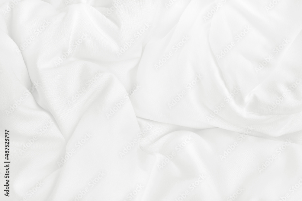 Texture of white blanket and bedding sheet with crumpled or messy in bedroom after wake up. Texture of white blanket and bedding sheet with crumpled or messy in bedroom after wake up.