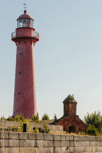 View from the water of the Kronshlot fort, the lower sash lighthouse on the island, the waters of the Gulf of Finland, the fairway of Kronstadt.