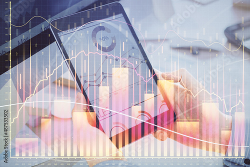 Wallpaper Mural Double exposure of man's hands holding and using a phone and financial graph drawing. Analysis concept. Torontodigital.ca