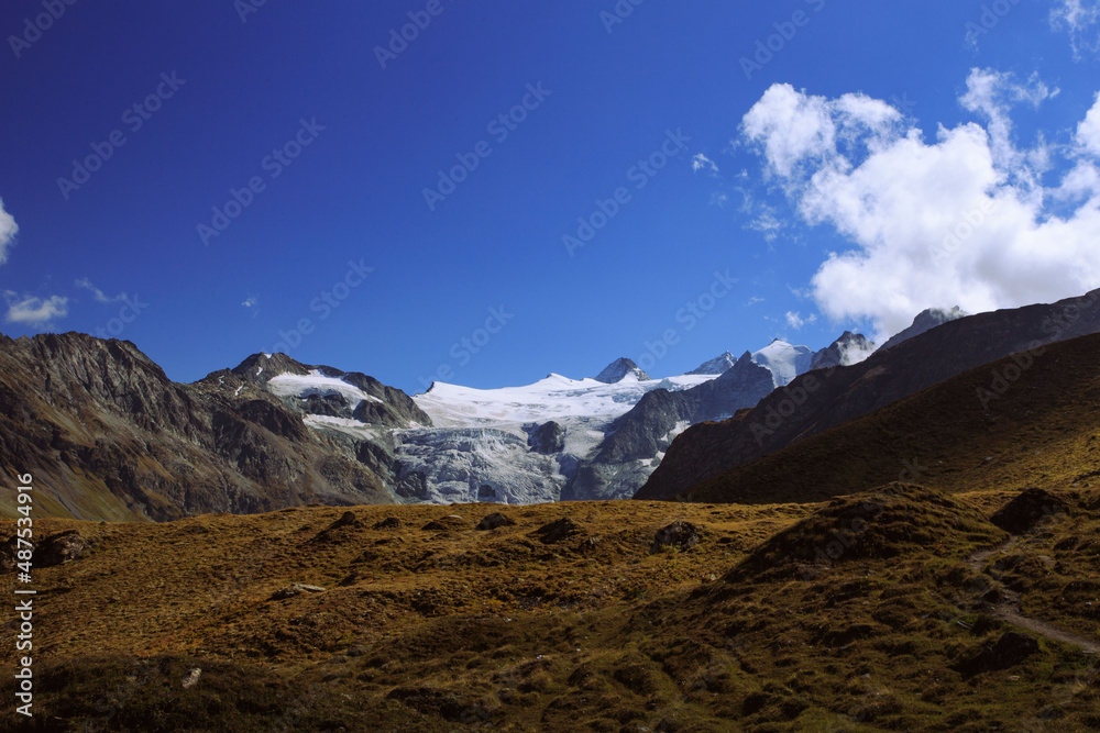 Landscape with a glacier and mountains in the background Landscape with a glacier and mountains in the background