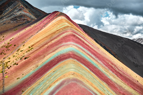 Rainbow Mountain or Vinicunca is a mountain in the Andes of Peru. photo