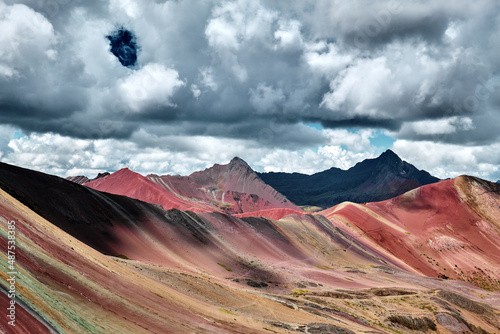Rainbow Mountain or Vinicunca is a mountain in the Andes of Peru. © badahos