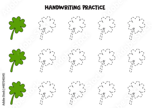 Tracing contours of cute shamrocks. Writing practice.