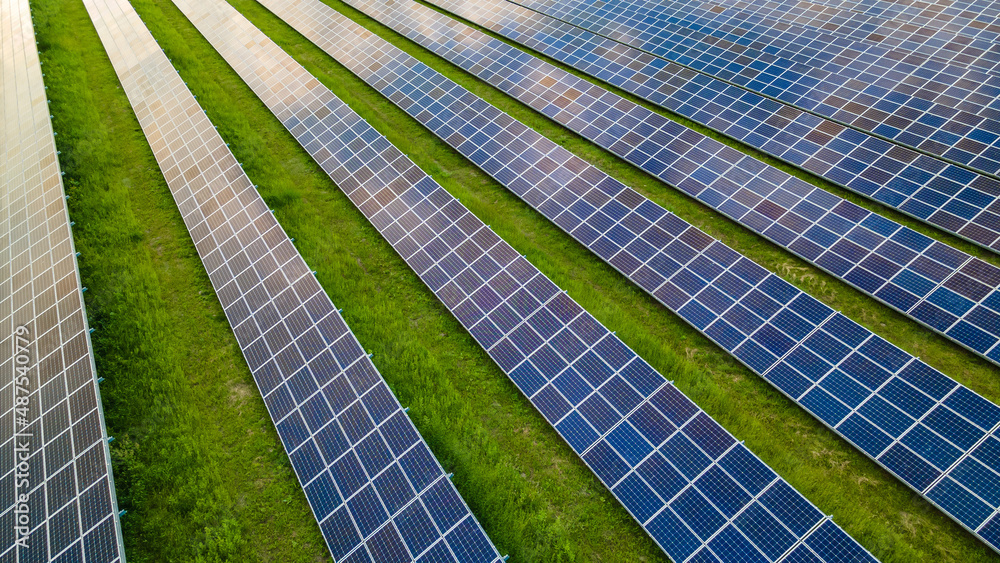 Top view of solar panels on a sunny summer day in Europe