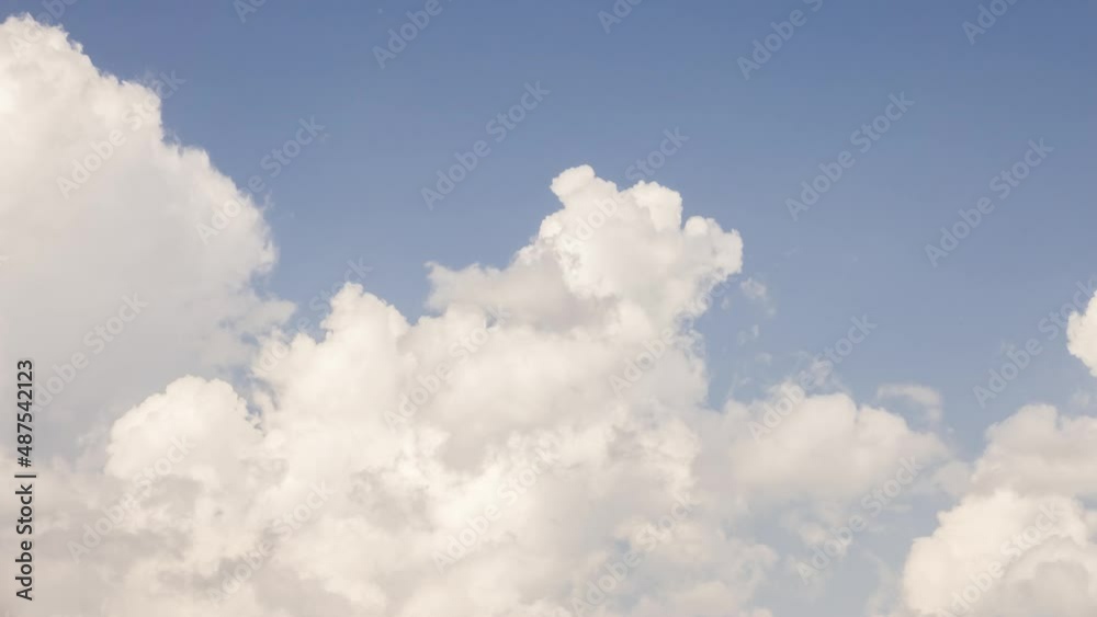 Puffy clouds forming on the blue sky. (timelapse) Puffy clouds forming on the blue sky. (timelapse)