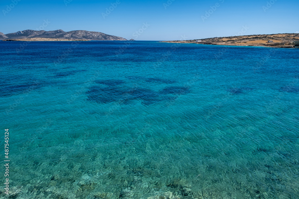 Greece, Lesser Cyclades island. Koufonisia. Rippled Aegean Sea turquoise water and clear blue sky