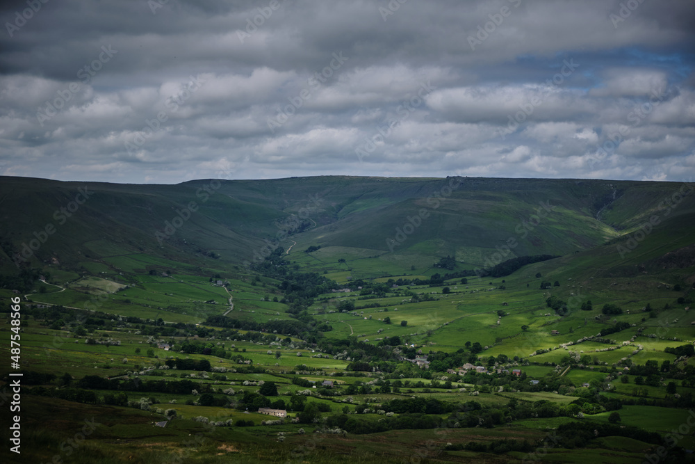 view of the valley with dark dramatic sky