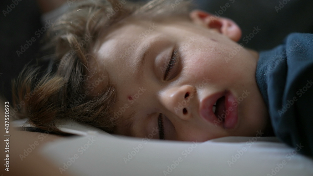 Child sleeping close-up face small boy asleep napping Child sleeping close-up face small boy asleep napping