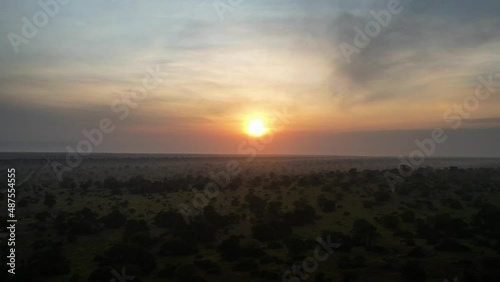 Aerial travelling of a sunrise in Africa Savannah - Angola photo