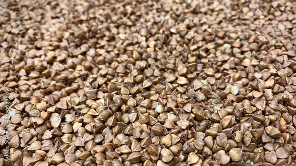Buckwheat texture background. Natural healty food, vegan diet Buckwheat texture background. Natural healty food, vegan diet